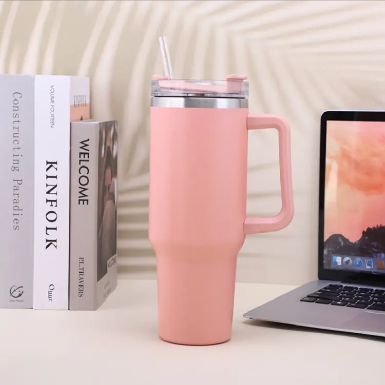 https://baretumblers.com/wp-content/uploads/2023/02/thermal-insulated-stanley-40-oz-tumbler-with-handle-warm-pink-2.webp